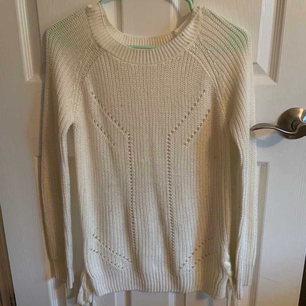 White sweater that ties at the bottom